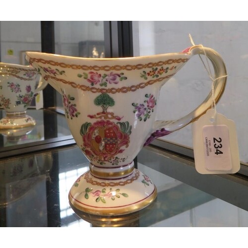A Chinese export style jug, with entwined handle, enamelled ...