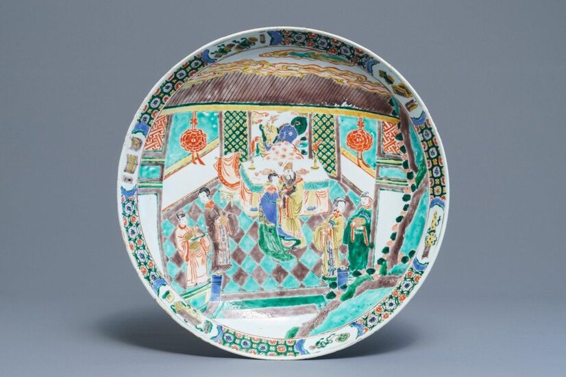 A Chinese famille verte charger with figures in...