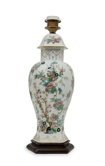 A Chinese porcelain hexagonal vase lamp, late 20th century, decorated with flowering blossoms, on a stained wood base, 40cm high It is the buyer's responsibility to ensure that electrical items are professionally rewired for use