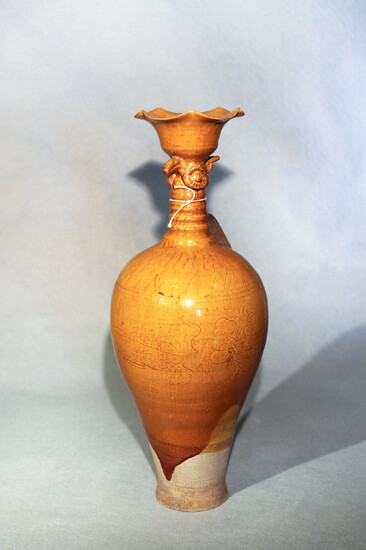 A Chinese straw glazed, pottery bird headed vase incised floral detail, Liao Dynasty type, 40cm