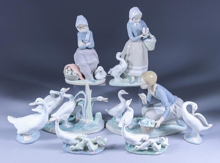 A Collection of Lladro and Nao Porcelain Figures, including...