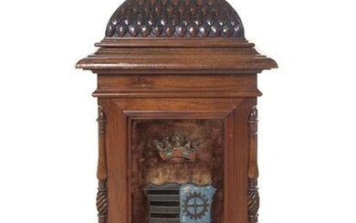 A Continental Carved Mahogany Cabinet