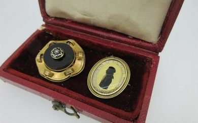 A Continental black enamel silhouette brooch and