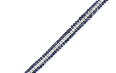 A DIAMOND AND SAPPHIRE BRACELET set with a row of forty