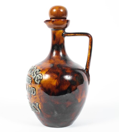 A Doulton Lambeth stoneware Melrose Highland Whisky jug and stopper, late 19th century
