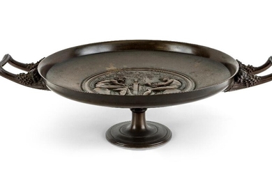 A French bronze tazza, cast by Barbedienne, after Ferdinand Levillain (1837-1905), c.1870, the shallow dish with central relief depicting classical figures entitled MENALCAS MOPSUS, INSCRIBE F.LEVILLAIN, the foot rim inscribed F.BARBEDIENNE, 48cm...