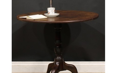 A George III mahogany tripod occasional table, one-piece cir...