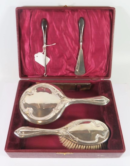 A George V Cased Silver Backed Mirror, Brush and Comb Set, B...