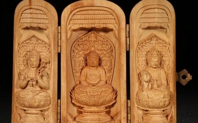 A HUANGYANG WOOD THREEN BUDDHAS CARVED SHRINE