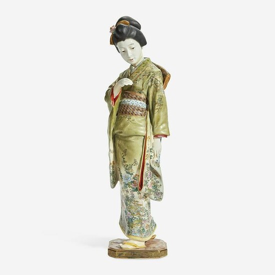 A Japanese enameled Satsuma-type pottery figure
