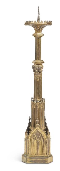 A LARGE GILT METAL GOTHIC REVIVAL CANDLESTICK