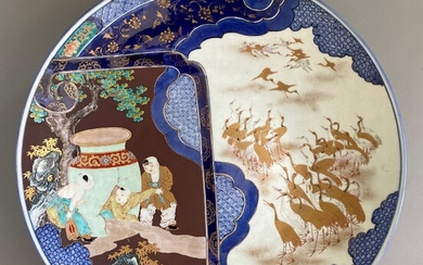 A LARGE IMARI PORCELAIN CHARGER WITH SHIBA ONKO AND CRANES