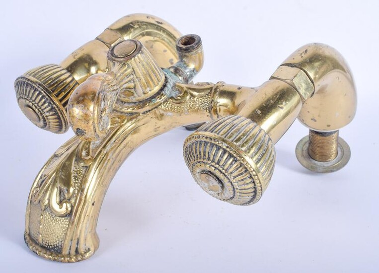 A LARGE VINTAGE PAIR OF BRASS TAPS probably Edwardian.