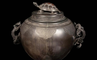 A Large Bronze Covered Jar