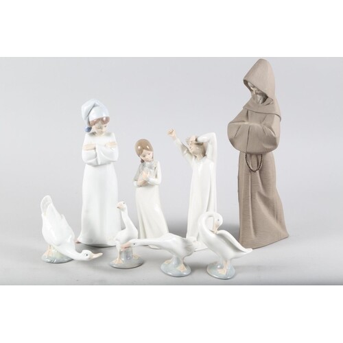 A Lladro brown bisque figure of a bearded monk, 2060, 13" hi...