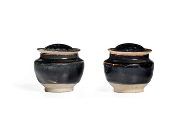 A PAIR OF SMALL HENAN BLACK-GLAZED LIDDED JARS Song/Jin dynasty...