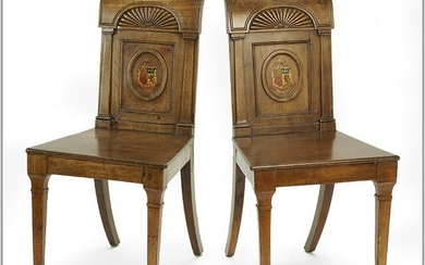 A Pair of Carved Wood Side Chairs.