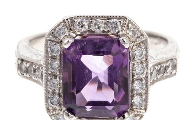 A Platinum Diamond & Amethyst Ring