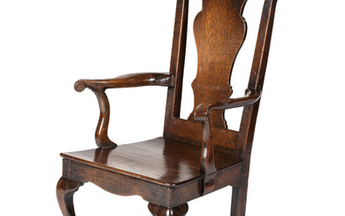 A Queen Anne Volute Carved Oak Open Armchair