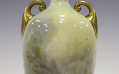 A Royal Worcester two-handled vase, circa 1920, painted by H. Stinton, signed, with two Highland cat