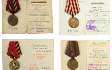 A SET OF SOVIET RUSSIAN MEDALS WITH DOCUMENTS