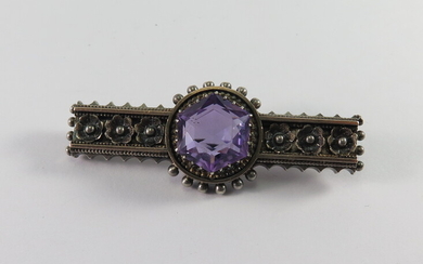 A VICTORIAN AMETHYST AND SILVER BROOCH