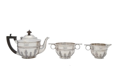 A Victorian silver bachelor's tea service, applied with lamb...