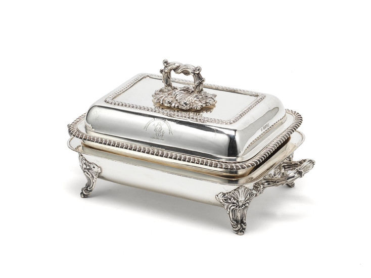 A Victorian silver entrée dish and cover with warming base