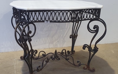 A WROUGHT IRON BASED MARBLE TOP CENTRE TABLE