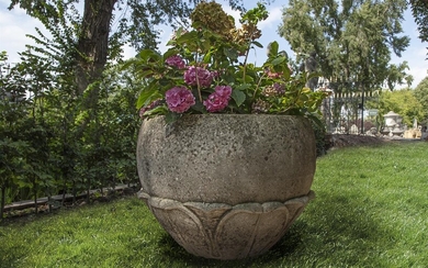 A carved limestone planter