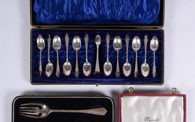 A cased set of twelve silver engraved tea spoons and sugar tongs by John Round & Son