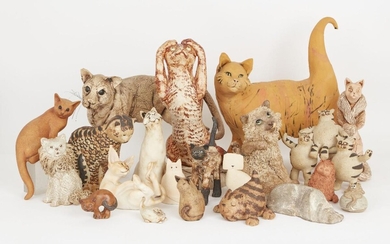 A collection of biscuit fired pottery cats, to include a large Abington pottery cat attributed to David Lane, impressed stamp to underside, 38cm high; stoneware Burslem pottery ginger cat, 33cm high; a Kay Goldfinch hand-painted pottery cat; a...