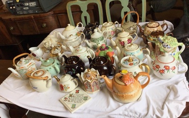 A collection of ceramic teapots, Victorian, Edwardian and later, including...