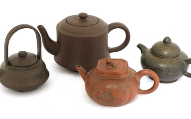 A collection of four Chinese Yixing zisha teapots