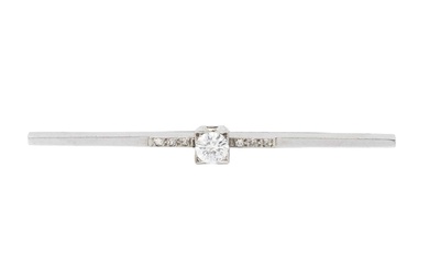A diamond bar brooch, the single brilliant cut stone of...