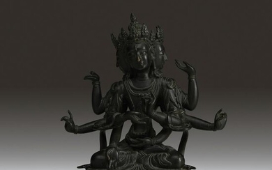 A finely cast and finished Tibeto-Chinese bronze figure