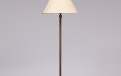 A floor lamp, yellow metal, mid 20th century.