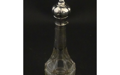 A glass scent / perfume bottle with a Dutch silver top, c. 1...