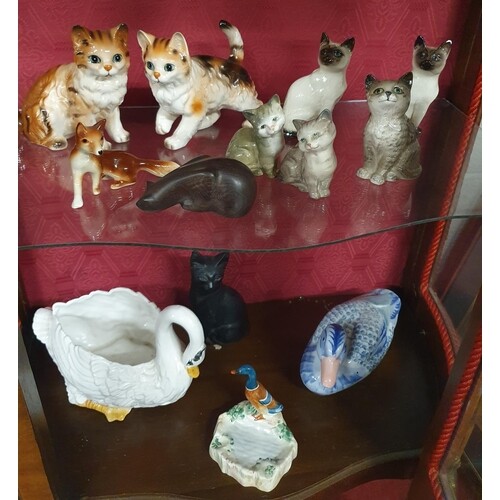 A good quantity of Beswick, Royal Doulton and other Animals.