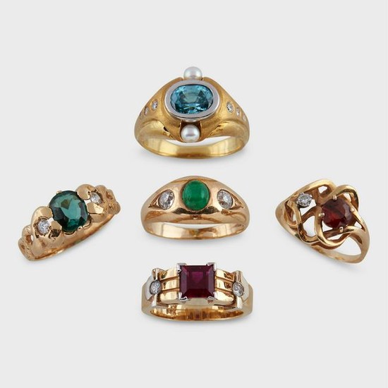 A group of gem-set fourteen karat gold rings
