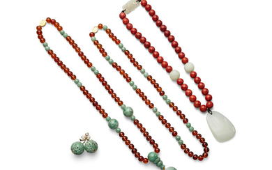 A group of three necklaces and a jadeite earring