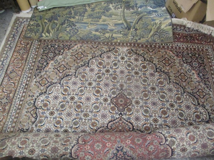 A large Indo-Persian carpet having multiguard borders and ge...