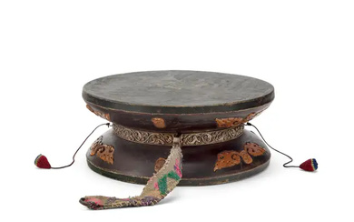 A large Tibetan wooden ritual drum, damaru 19th/20th century The hand-held instrument...