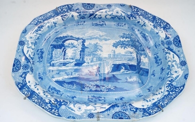 A large Victorian Spode blue and white meat plate, with transfer printed scene of a European Classical landscape, with foliate decoration to the rim, impressed mark 'Spode A' to the underside, 58.5cm x 46cm