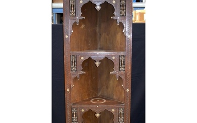 A large carved wood Moorish corner display cabinet inlaid wi...