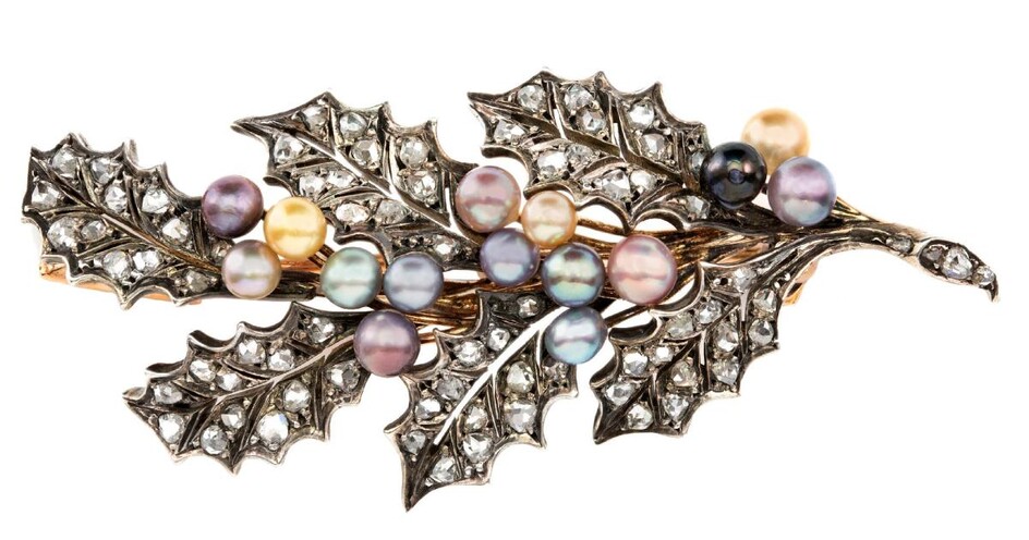 A late 19th century diamond and pearl brooch, designed as a spray of Holly leaves set with rose-cut diamonds, embellished with seed pearl berries of various tints, mounted in silver and gold, French assay marks stamped to reverse, detachable brooch...