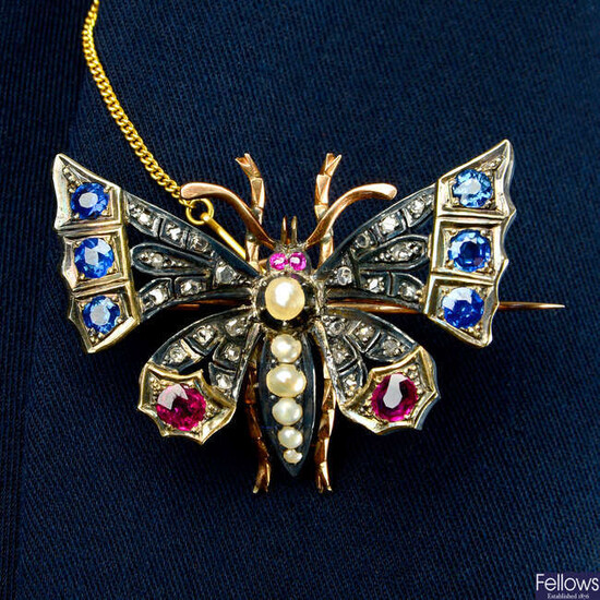 A late 19th century silver and gold, split pearl, rose-cut diamond, sapphire and ruby butterfly brooch.
