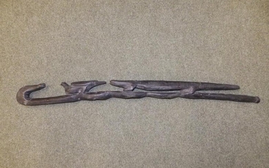 A late 19th/early 20thC carved wood African staff, decorated...
