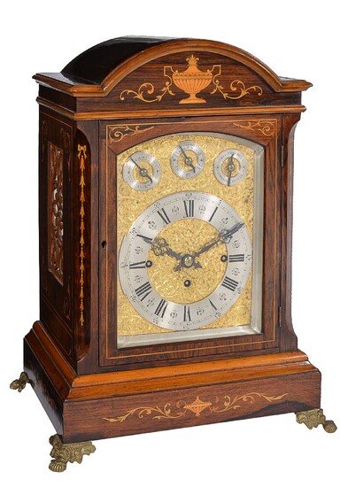 ? A late Victorian inlaid rosewood quarter chiming bracket clock