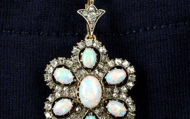 A late Victorian silver and gold, opal and old-cut diamond floral cluster pendant.